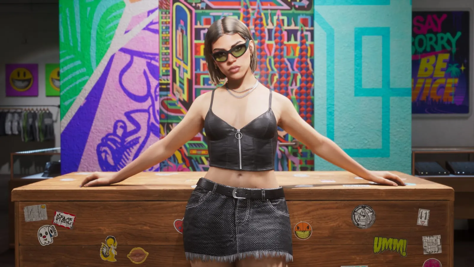 Woman in a leather bustier and green sunglasses leaning on a sticker covered shop counter