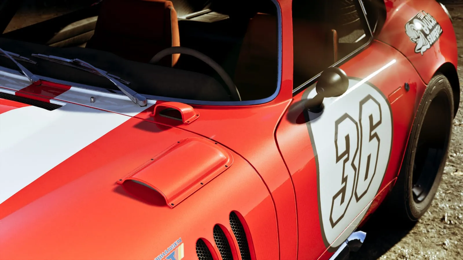 Hood and door of a red racing car with white stripe carrying the number 36